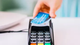 How Splitting Payments Protects Credit Scores From High Balance Reporting On Cards