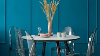 How Using Clear Acrylic Chairs Creates An Uncluttered Visual Flow In Small Rental Dining Spaces