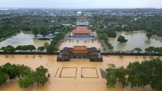 Record rains in Vietnam kill 9, flood 100,000 homes