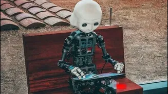 Oracle layoff emails show companies replacing human roles with AI