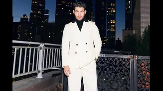 Nick Jonas Works A Classic White Suit; Proves Fashion Is More Than Black or Navy