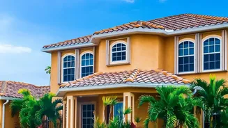 How Tropical Home Garden Plants Include Palms And Flowering Varieties For Contrast