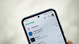 WhatsApp iOS beta gets channel invite feature and AI-powered status tools