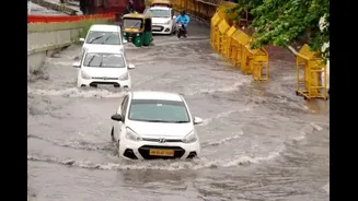 Heavy Rain Brings Delhi NCR To A Standstill: Waterlogging, Traffic Jams Hit Several Areas | Videos