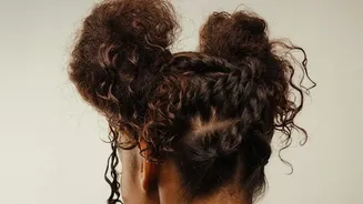 A Twisted Pencil Bun Can Look Polished with Minimal Effort