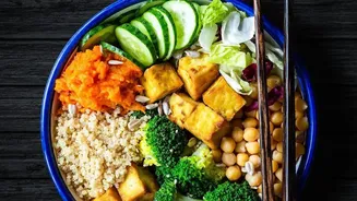Gochujang gives tofu rice bowls fermented heat and sweetness Has A Practical Side: Crisping tofu separately helps preserve texture