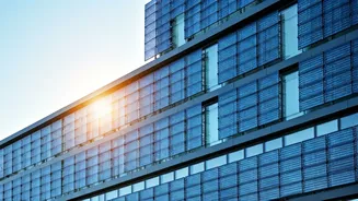 Semi-Transparent Solar Cells: Powering Windows of the Future?