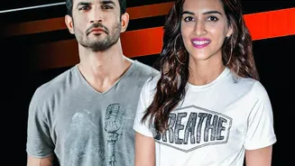 Kriti Sanon's Stability-Ball Workout Shows An Advanced Hanging Core Challenge And Uses Trainer Support During The Exercise