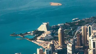 A Short Qatar Travel Itinerary Highlights The Appeal Of Sand Dunes And Waterfronts
