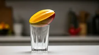 This Viral Drinking Glass Mango Peeling Hack Is Genius