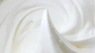 Toum Uses Garlic and Oil to Create a Fluffy White Sauce