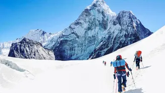 Mount Everest season opens late, with climbers undeterred by huge ice block and high travel costs