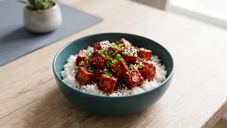 The dish is Korean-inspired rather than a claim of strict authenticity Separates The Useful Gochujang gives tofu rice bowls fermented heat and swee...