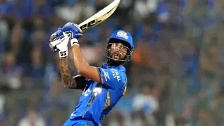 Tilak Varma scores half-century against Punjab Kings at Dharamshala while chasing formidable 200+ score