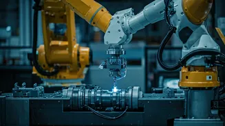 India's Factory Floor: Workers Training Robots for a Future They May Not Be In