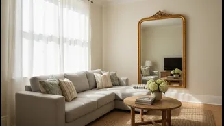 Mirrors And Sheer Curtains Can Help Daylight Travel Through Small Homes