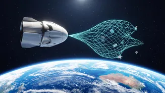 How New Space Cleaning Tech Uses Magnetic Nets To Catch Orbiting Satellite Junk