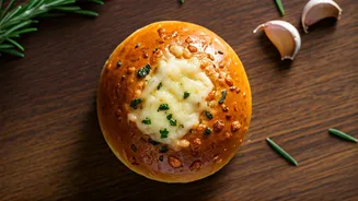 Cheese Garlic Buns Take Over Elite Bakery Window Displays