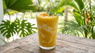 Mango And Coconut Water Help Build A Tropical Turmeric Smoothie