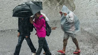 IMD warns of heavy rainfall in Gujarat, Delhi, Maharashtra
