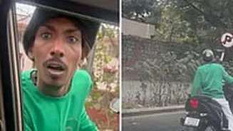 Bangalore Road Rage: Biker Jumps Traffic Signal, Says 'My Bike, My Rules'; Turns Aggressive, Tries To Slap Man Recording | Watch Video