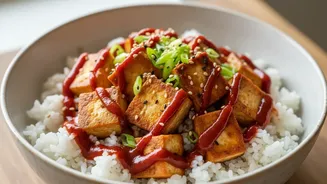 Gochujang gives tofu rice bowls fermented heat and sweetness Is More Useful With The dish is Korean-inspired rather than a claim of strict authenti...