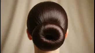 Strong-Hold Hairspray Helps the Low Bun Stay Polished through the Day