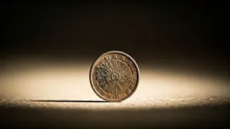 Currency Facts: दुनिया के सबसे छोटे मूल्य का सिक्का किस देश में चलता है?