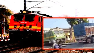 Train Honks Continuously, Crashes Into Truck at Railway Crossing Amid Heavy Traffic Near Deoghar – Video Surfaces