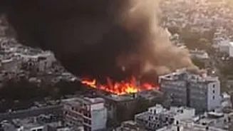Massive Fire In Lucknow Slum Sparks Cylinder Blasts, Hundreds Of Huts Destroyed - VIDEO