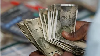 Indian rupee hits record low of 90.46 against US dollar