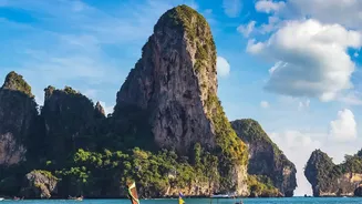 How to travel between Bangkok Chiang Mai and Krabi using budget flights and buses in Thailand