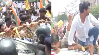 Protesting students break police barricades in Patna; Police use water cannons