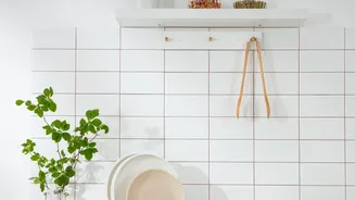 Modular Pegboards Help Small Apartment Renters Optimize Vertical Storage In Kitchens And Hallways Today