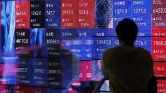 Asian stock markets mixed as investors await US inflation report