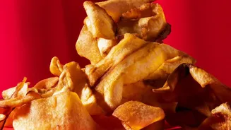 Crispy nadru chips gain popularity in city cafes as healthy air fried snack options