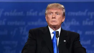 Trump administration sued over pause on immigrant visa processing policy