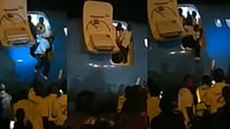 Air Congo Passangers Forced To Jump Off Plane After Airline Fails To Provide Stairs For Hours At Kindu Airport - VIDEO