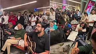 IndiGo Flight Delay Turns Into Live Concert; Passenger’s Performance At Mumbai Airport Goes Viral, Internet Calls Him ‘Mood Changer’ | WATCH