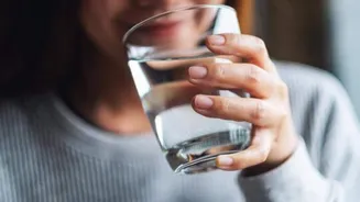 Does drinking water with meals cause bloating?