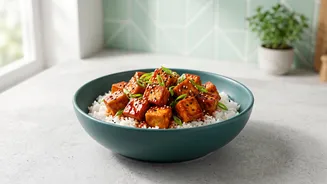 Gochujang gives tofu rice bowls fermented heat and sweetness: Crisping tofu separately helps preserve texture