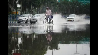 IMD Issues Rain Alerts for 14 States Amid Monsoon Retreat
