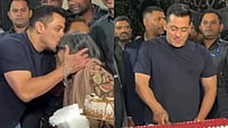 Salman Khan Turns 60: Actor Kisses Senior Journalist After Cutting Cake With Paps Outside His Panvel Farmhouse—VIDEO