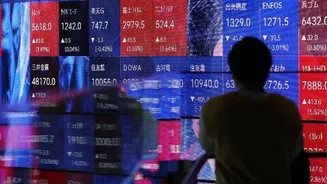 Asian markets slide after US tech tumble and oil jump