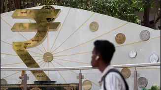RBI considers rate hike as rupee hits new low