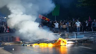 Anti-G7 protest turns violent in Geneva; Tesla torched, UN office windows smashed