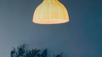 Upcycled home decor crafts: Creative ways to convert old glass bottles and fabric scraps into aesthetic room lighting
