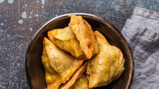 Air Fried Samosas And Chips Offer Crispy Satisfaction With Reduced Oil Content Today