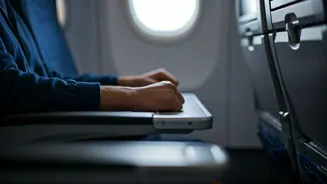 The Hand-Resting Secret: Why Flight Attendants Sit This Way During Takeoff and Landing