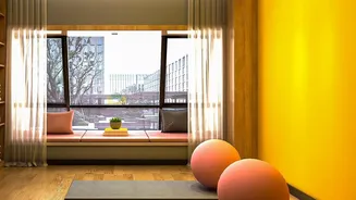 Desk-Job Yoga Draws Attention To Simple Workplace Yoga